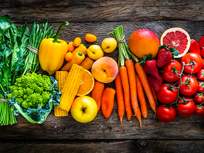 a colorful rainbow of mostly summer vegetables
